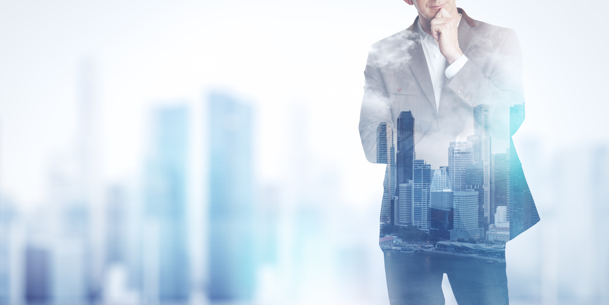 Compound image of a businessman with city skyline image showing through